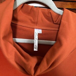 Small LuluB top, worn once from smoke free home.